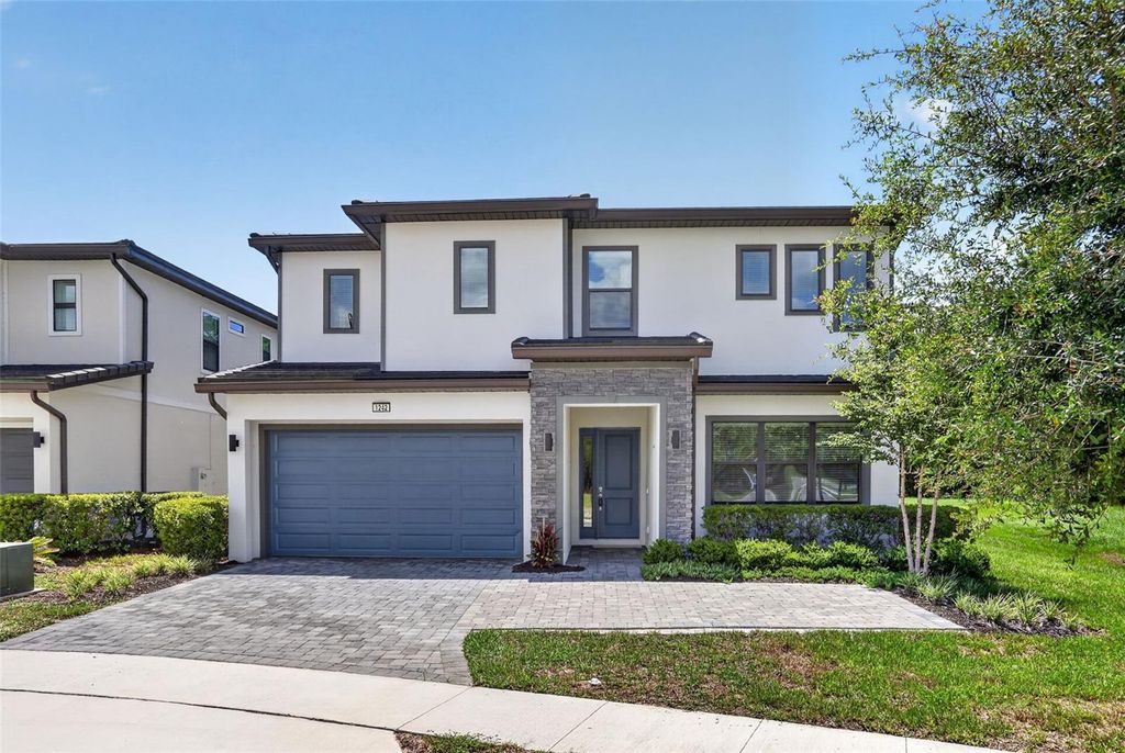 Photo of 1242 Butterfly Orchid Road, Davenport, FL 33837 (MLS # O6421680)