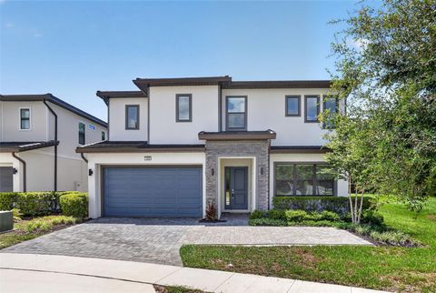 Photo of 1242 Butterfly Orchid Road, Davenport, FL 33837 (MLS # O6421680)