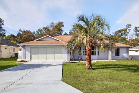 Photo of 902 NE 130th Terrace, Silver Springs, FL 34488 (MLS # OM715942)