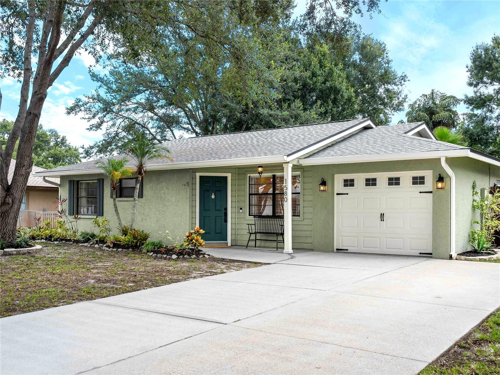 Discover refined comfort in this exquisitely remodeled single-family home, ideally
positioned in one of Sarasota’s most desirable communities. Priced at just $339,000,
this thoughtfully curated 2-bedroom, 1-bath residence blends timeless design with
modern finishes — offering a level of sophistication rarely seen at this price point.
From the moment you arrive, the home’s clean lines, mature trees, and inviting curb
appeal set the tone. Inside, soaring vaulted ceilings and abundant natural light create a
sense of spaciousness and serenity. The airy living area features plank luxury
vinyl flooring and a seamless flow ideal for both everyday living and elegant
entertaining.
The chef’s kitchen is a standout, complete with crisp bright cabinetry, Dallas
Wht granite countertops, and stainless-steel appliances — all thoughtfully arranged to
blend style and function.
The primary bedroom offers a peaceful retreat, while the bath showcases sleek granite
finishes and contemporary fixtures. Every room is finished with designer touches,
including modern ceiling fans, tailored blinds, and fresh neutral tones.
Step outside to your private, fully fenced backyard — a tranquil oasis shaded by mature
trees and ready for quiet mornings or evening gatherings.
Additional Highlights include an assumable mortgage, New Roof (2020), Oversized driveway, Energy-efficient
design with plenty of shade for natural climate control, Smart features including thermostat & doorbell, Special outlet installed ready for
your EV Charging, 3rd nail on trusses for insurance discount & peace of mind, Side-by-side refrigerator with in-door ice and water dispenser, Self-Cleaning, glass top range, Storage shed, Pergola, and Large Lanai.
Capture an exceptional opportunity to live in one of Sarasota’s most convenient and
well-connected communities—Deer Hollow, where suburban calm meets elevated
accessibility. Nestled within a serene, deed-restricted enclave, this residence offers the
rare combination of privacy, lifestyle, and value—with an extraordinary low annual HOA
of just $534, zero CDD fees, and no flood insurance required.
Positioned in Flood Zone X for added security and peace of mind, this home sits
moments from the region’s most coveted destinations. World-class shopping, dining,
and recreation are at your fingertips—UTC Mall, Nathan Benderson Park, Tiger Wood’s
PopStroke, and Waterside Place are just minutes away. Quick runs to Publix, Lowes, and Target are less than 2 miles away. Enjoy effortless commutes via I-75 or head west to Downtown Sarasota, St. Armand’s Circle, and the Gulf Coast’s
iconic light sand beaches in under 15 miles.
Weekends transform into elevated experiences with boutique shopping, culinary
adventures, and cultural gems like the Asolo Theatre, Van Wezel Performing Arts Hall,
and Mote Marine Laboratory just minutes from your doorstep. Whether you’re savoring
sunset walks on Lido Beach or exploring the vibrance of Siesta Key, life here unfolds
beautifully.
This meticulously maintained community features tranquil walking trails, a playground,
and a park-like ambiance.
This is more than just a house, it’s the convenience you’ve been looking for and the
lifestyle you deserve.