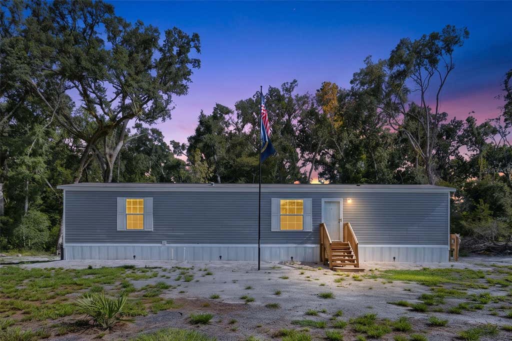 Photo of 311 NE 316th Avenue, Old Town, FL 32680 (MLS # GC542242)
