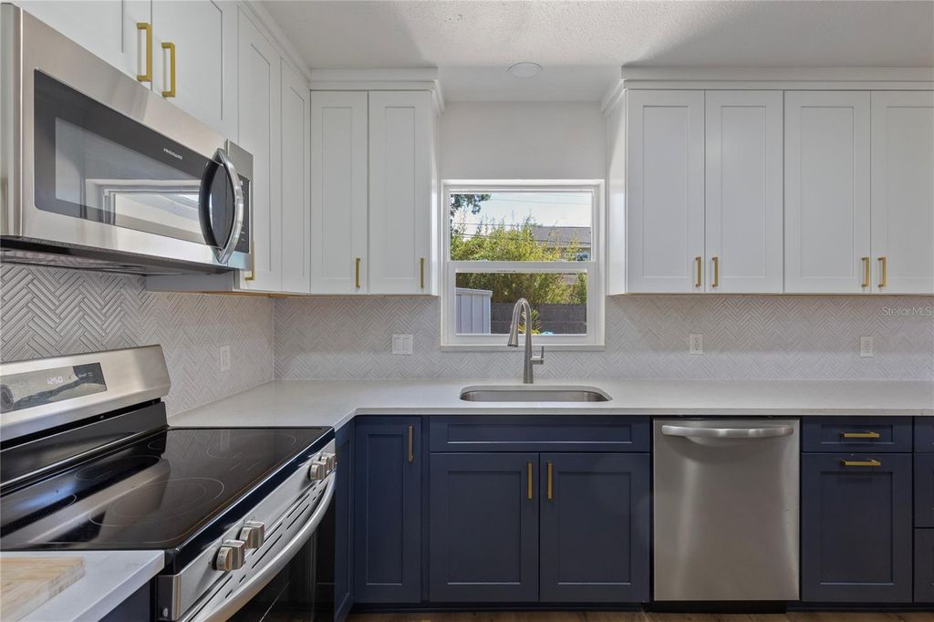 Photo of 1715 Thomas Drive, Clearwater, FL 33759 (MLS # TB8491800)