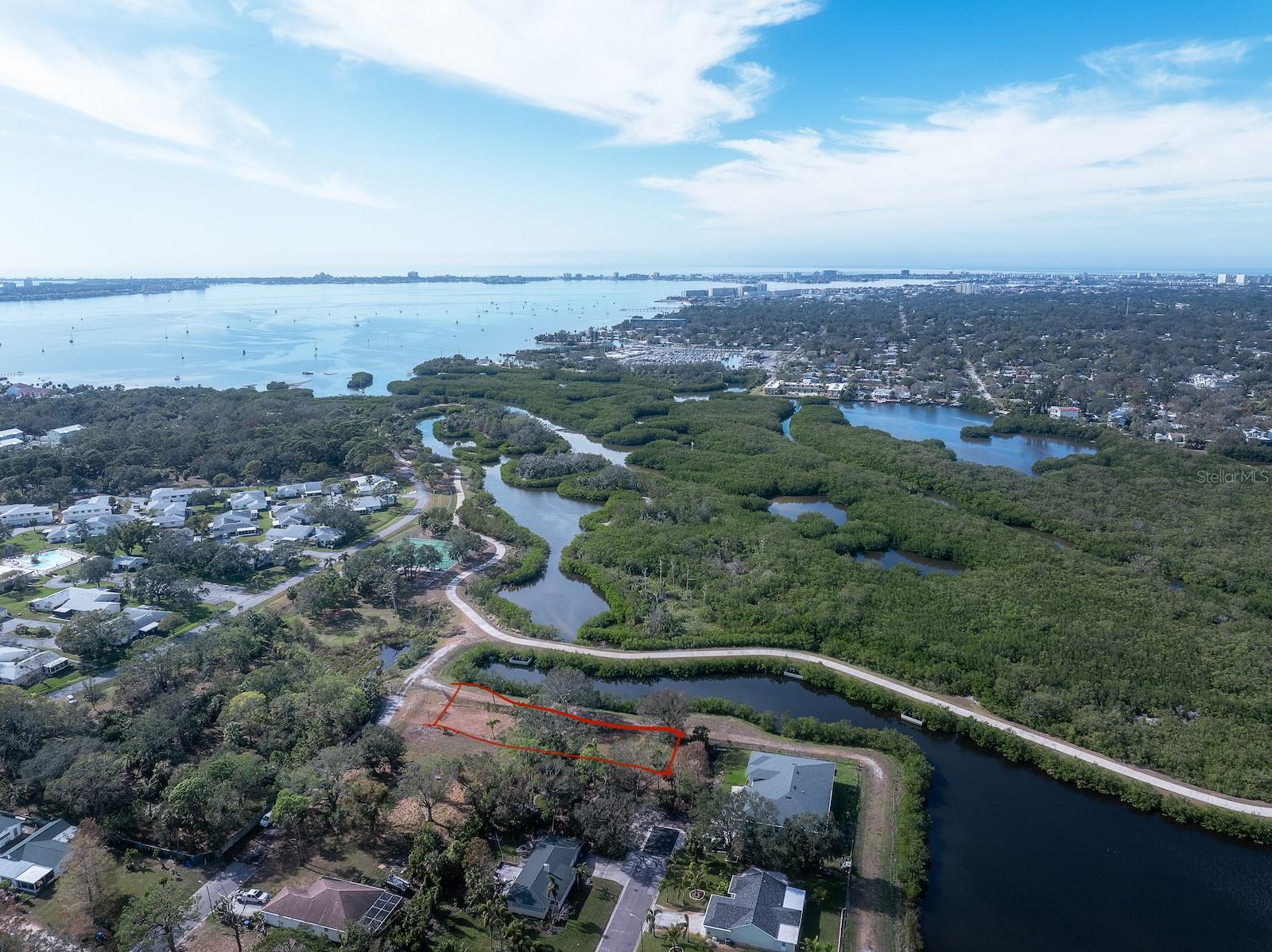 Rare opportunity to own a 212 ft double lot right next to Clambayou Nature Preserve providing an epic view and direct access to trails and water. Build your dream home in this dreamy location with amazing neighborhood amenities. The property is 2 blocks from the New Skyway Village development that will provide shops, resturants and a Sprouts, 1 mile from the tiki docs with life music and great food, two marinas less than 2 miles away, Golf Course a few block away, Skyway Marina District and all its new developments, Easy access to beaches, Downtown St. Pete, Downtown Gulfport and 275. The lot is zone NS1 and measures 50 ft wide and 212 ft long. If you want help finding a builder don't worry we are lining up a few local builders with design options that work for lot.
Be sure to bring your bikes and paddle boards when you come to view the site and take advance of the water and trails you can bike to downtown Gulfport in 15 mins or the Tiki Docs in 10 min.