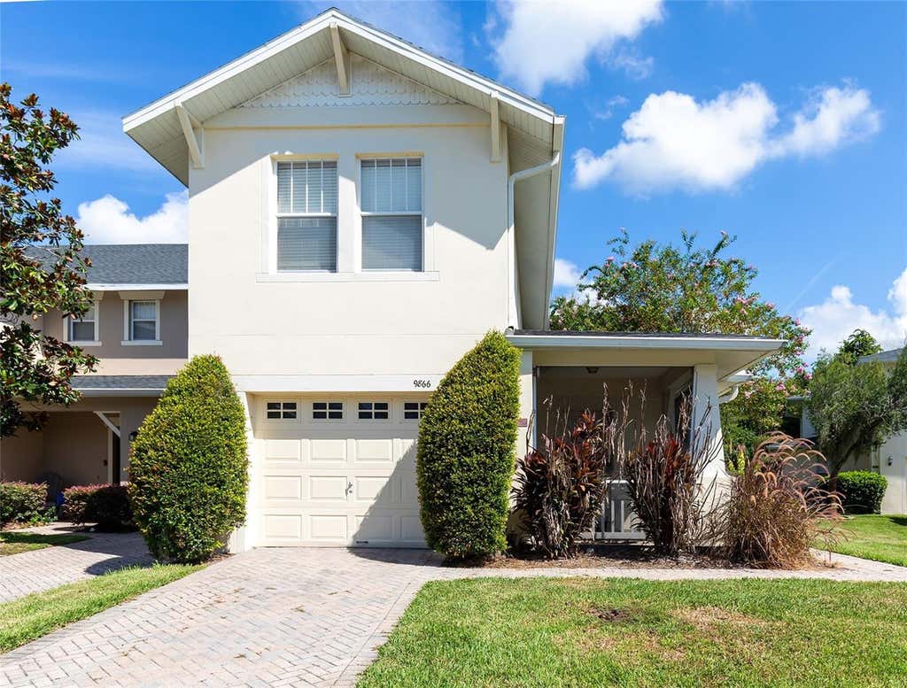Photo of 9866 Tivoli Villa Dr, Orlando, FL 32829 (MLS # O6432061)