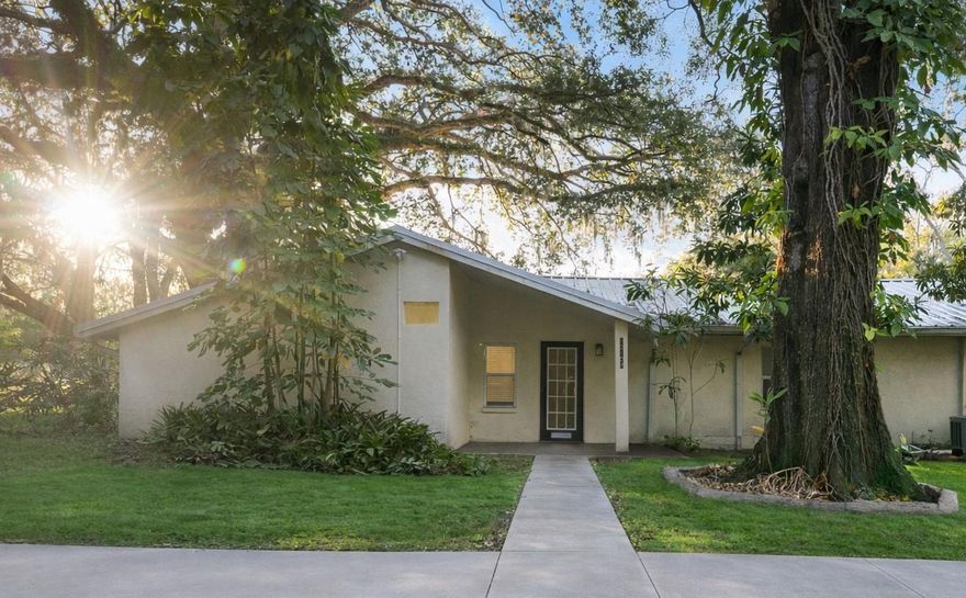 Discover the perfect balance of privacy and convenience in this spacious ground-floor 3 bedroom, 2 bathroom residence located on a lush, secluded 3-acre property in the heart of Tampa. With only four other residences on site, all professionally managed by the same ownership group, this community offers a park-like, nature-filled setting while remaining close to everything.

Enjoy cathedral ceilings that create an open, airy living space filled with natural light. The unit features All-New stainless steel appliances, a full-size washer and dryer, and thoughtful finishes throughout.

Step outside to the patio and outdoor area, surrounded by mature trees and natural landscaping perfect for relaxing, working from home, or entertaining. A dedicated shed is available for extra storage.

Located just minutes from USF, Telecom Park, and major employment hubs, with easy access to I-75 and I-275, you're truly in the center of it all without the noise or congestion.