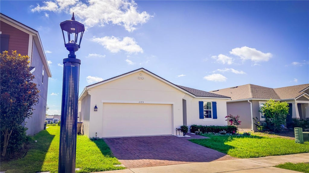 Photo of 1173 Lakeshore Breeze Place, Kissimmee, FL 34747 (MLS # O6421453)