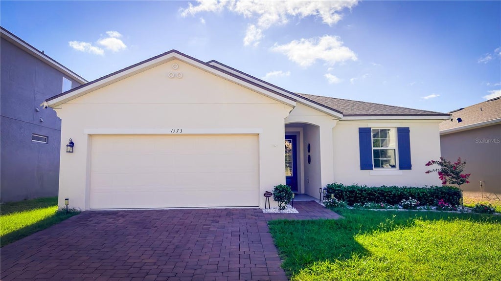 Photo of 1173 Lakeshore Breeze Place, Kissimmee, FL 34747 (MLS # O6421453)