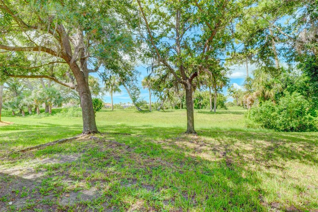 Photo of 694 Rotonda Circle, Rotonda West, FL 33947 (MLS # D6143285)