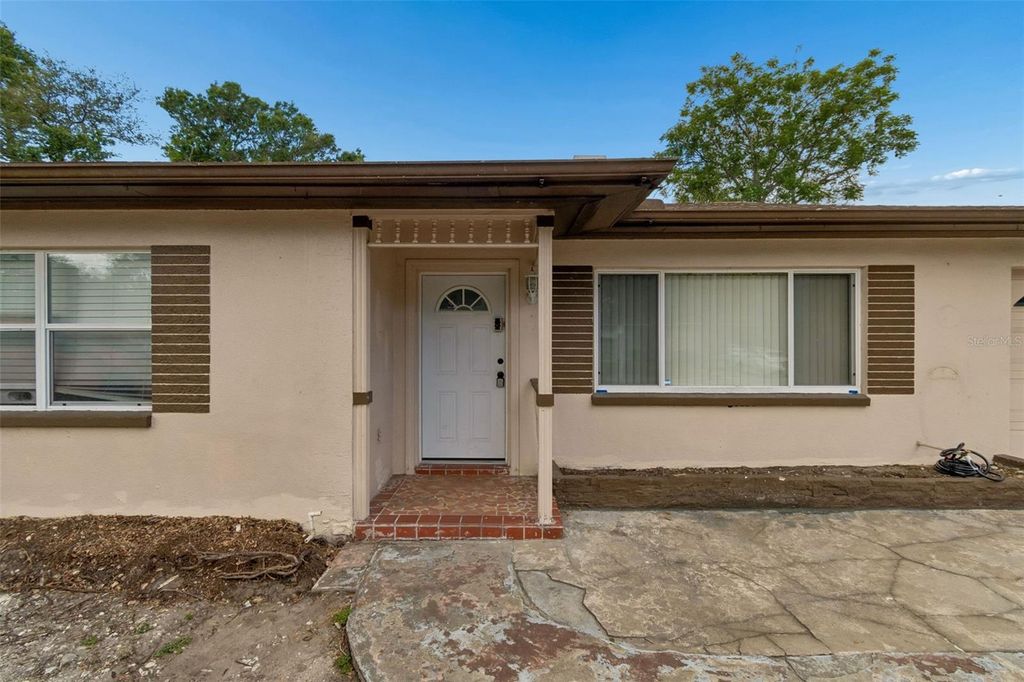 Photo of 704 Brookside Drive, Clearwater, FL 33764 (MLS # TB8490111)