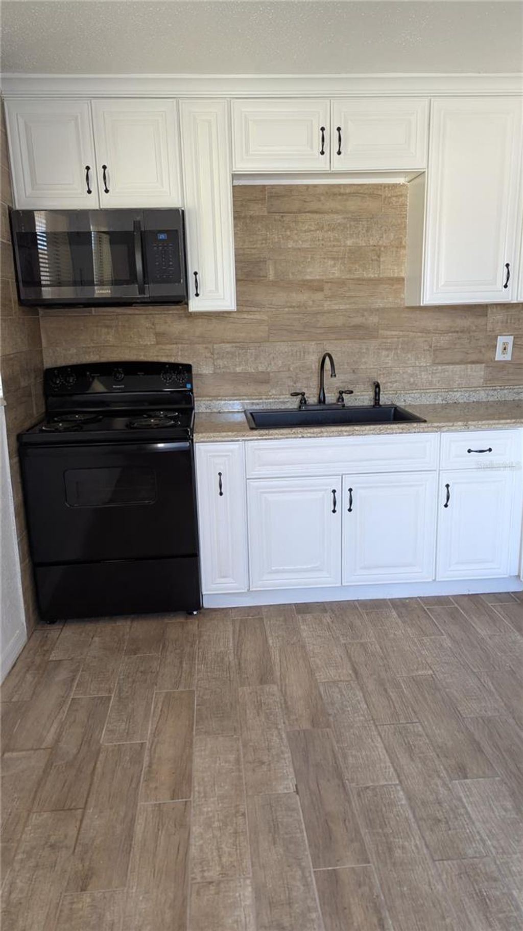 Photo of 4816 Edgemoor Avenue, Orlando, FL 32811 (MLS # O6396428)