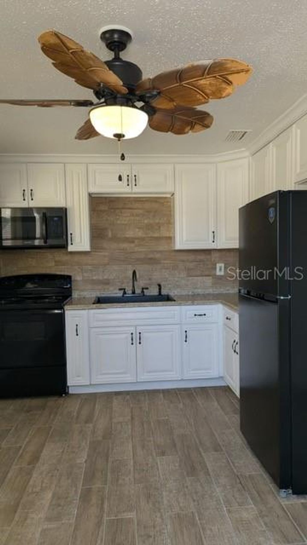 Photo of 4816 Edgemoor Avenue, Orlando, FL 32811 (MLS # O6396428)