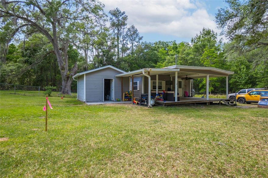 Welcome to 20496 Edwards Ave, located in the heart of Brooksville! This charming mobile home offers a fantastic investment opportunity.  Nestled on a spacious lot with a fenced backyard, this property features an inviting front porch perfect for relaxing evenings.
Inside, the home boasts a large living room with abundant natural light, a functional kitchen with ample cabinetry, and a cozy dining area.
 The updated bathroom, spacious kitchen, and plentiful storage solutions make this home both comfortable and practical.
Enjoy peaceful living with the convenience of being minutes away from historic downtown Brooksville, parks, shopping, and dining.

THIS IS AN INCREDIBLE INVESTMENT OPPORTUNITY! 
In addition to this lovely home, the neighboring single family home is also available for purchase from the same owner! Creating a rare chance to own multiple properties together, offering endless potential. Whether you dream of building additional homes, creating a family compound, or developing investment rentals, the possibilities here are truly unmatched. 

Don't miss your chance to own this affordable, potential income-generating property! Whether you're a seasoned investor or just starting your rental portfolio, this property offers immediate cash flow and future growth potential.