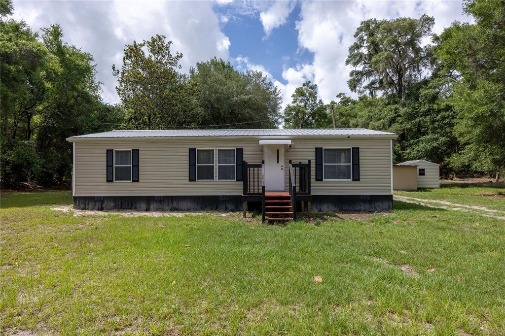 Photo of 4950 SW 80th Street, Chiefland, FL 32626 (MLS # GC540229)