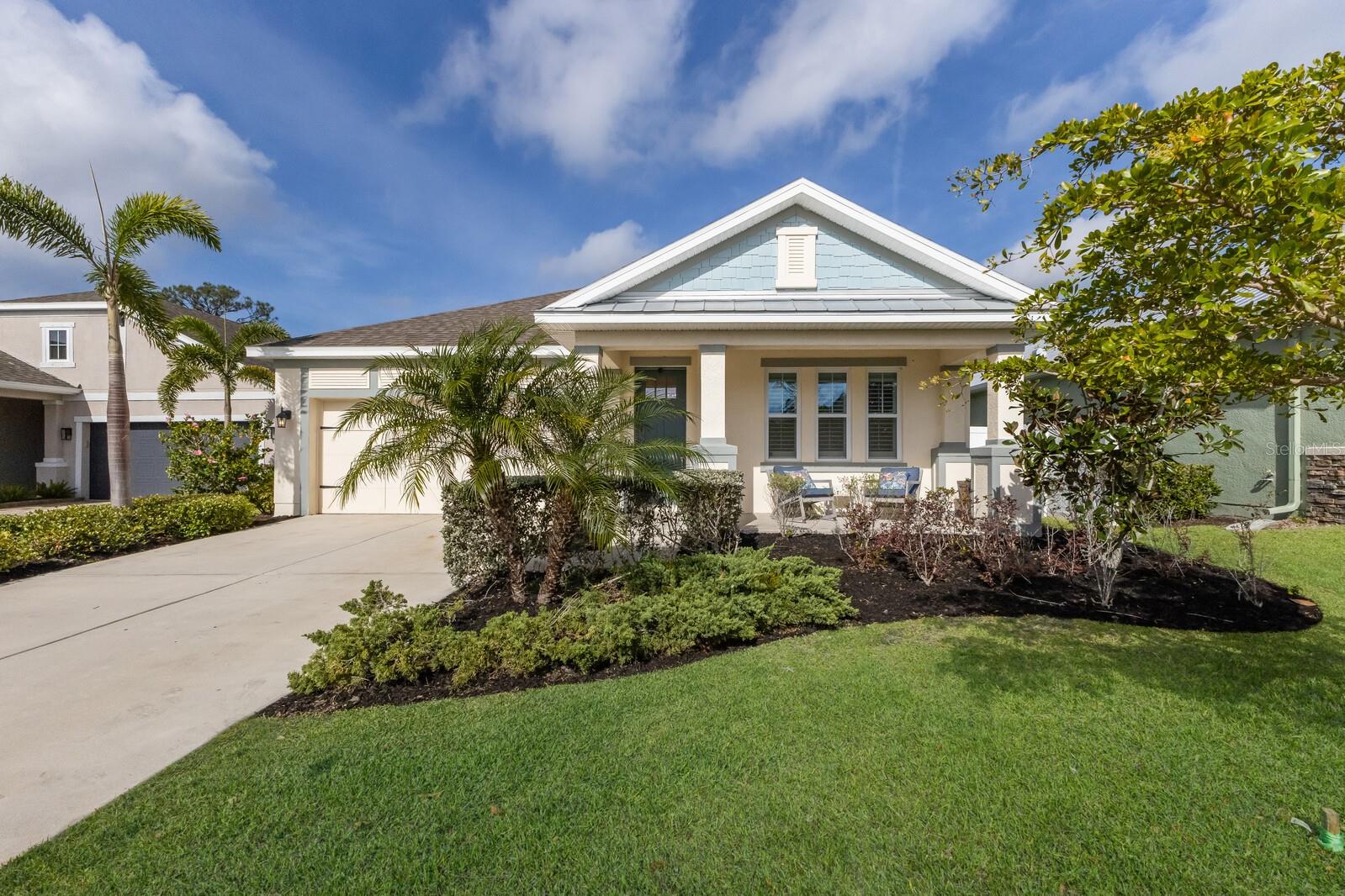 Built in 2018, this thoughtfully designed residence offers comfort, convenience, and plenty of character. Located at the end of a cul-de-sac in the peaceful enclave of Palmer Park, the home backs up to a quiet preserve—fully fenced for privacy and offering peace of mind with no storm damage. You’re also just minutes from downtown Sarasota, UTC, I-75, parks, world-class beaches, dining, shopping, and cultural attractions.
Inside, an open floor plan welcomes you with ceramic wood-look tile flooring, high ceilings, and abundant natural light. The living space flows seamlessly into a well-appointed kitchen featuring upgraded cabinetry, quartz countertops, stainless steel appliances, a hidden microwave (2024), herringbone subway tile backsplash, and a gas cooktop. A den with built-in desks provides the perfect space for remote work or after-school activities.
The home offers a desirable layout with a spacious primary suite, a junior suite positioned on the opposite side of the home for added privacy, plus two additional guest bedrooms with a Jack & Jill bath. The primary bath boasts a rainfall shower, while custom closets with a lifetime warranty enhance storage throughout.
Step outside to a covered, screened-in lanai overlooking a fully fenced backyard that backs up to a serene preserve. With ample space for a pool, this outdoor retreat offers privacy and peace. Best of all, the home has weathered recent storms with absolutely no damage, giving peace of mind to future owners.
Recent upgrades include custom laundry room cabinetry and alcove (2024), along with meticulous upkeep including routine HVAC, pest control, vent and chimney sweep, water filter service, and more.
From the welcoming front porch to the serene preserve views out back, you’ll love every corner of this home. Thoughtfully designed with space for connection and privacy, it’s a place you’ll be proud to call home.