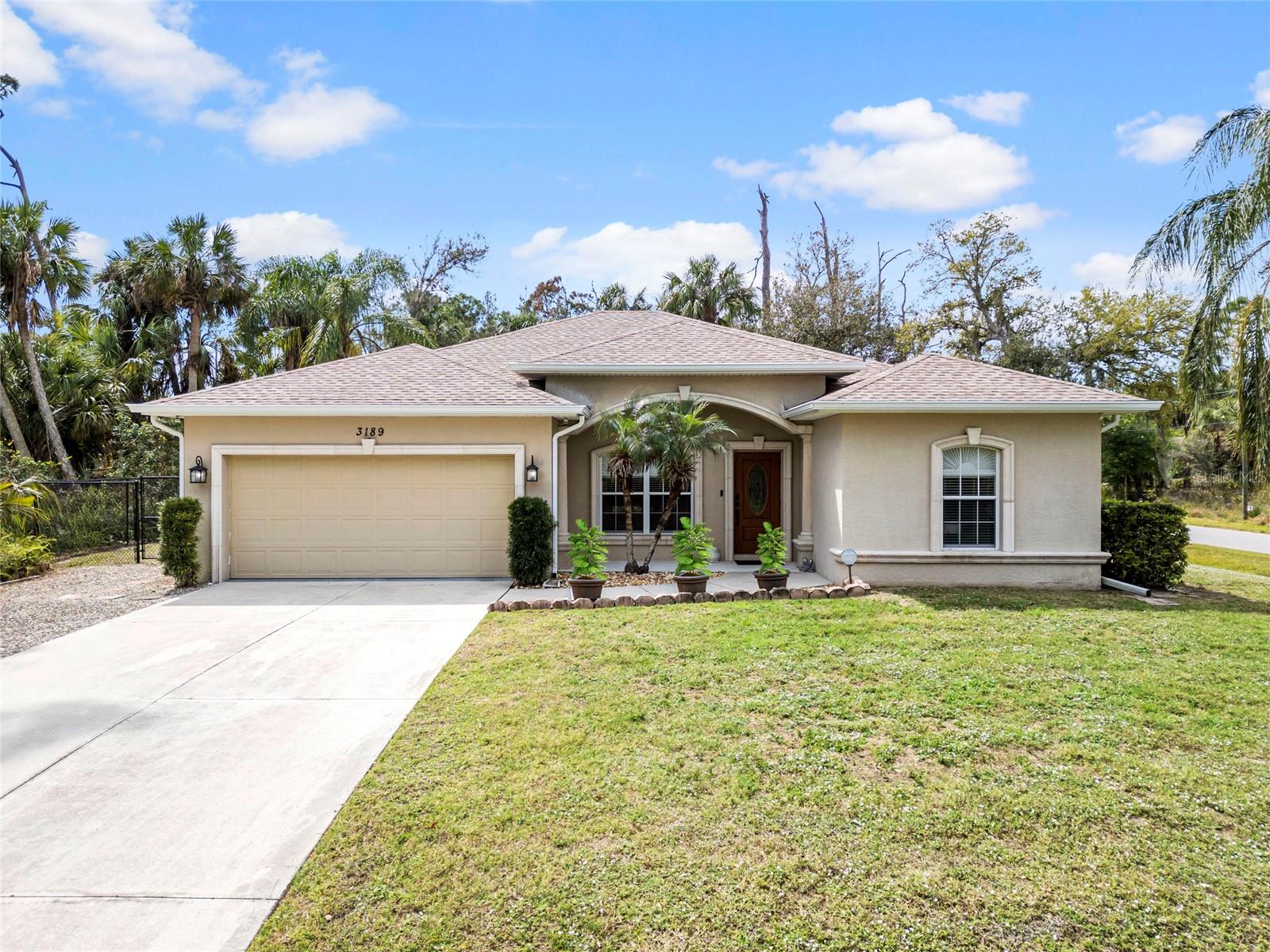 Welcome to 3189 Seattle Ave, North Port, FL 34286—a beautifully designed Windermere CUSTOM-BUILT home nestled in a peaceful and vibrant subdivision in the heart of North Port. This 3-bedroom, 2-bathroom home plus a DEN/STUDY/OFFICE offers an ideal blend of comfort, functionality, and style with 1,702 sq. ft. of living space on an oversized corner lot.
Step inside and be greeted by an updated kitchen featuring solid wood cabinets, a custom range hood, soft-close drawers, a breakfast bar, and newly installed stainless steel appliances—perfect for those who love to cook and entertain. Both the primary and guest bathrooms have been thoughtfully updated with modern vanities, adding a touch of elegance to the home. A separate laundry room with built-in shelving provides ample storage space for added convenience.
Enjoy peace of mind with a whole-house reverse osmosis system, ensuring high-quality water throughout the home. The FULLY FENCED BACKYARD, complete with a fire pit, offers plenty of space for kids and pets to play while creating the perfect outdoor retreat for gatherings and relaxation.
Located in Flood Zone X (meaning no flood insurance required) and with NO HOA DUES, this home provides financial ease and flexibility. Its prime location places you just minutes from shopping, dining, local beaches, and easy access to I-75 for seamless commuting. Plus, you're just a short drive from Wellen Park, a thriving planned community offering additional shopping, restaurants, and entertainment options.
Don’t miss out on this incredible opportunity to own a move-in-ready home in one of North Port’s most desirable neighborhoods! Schedule your private showing today.