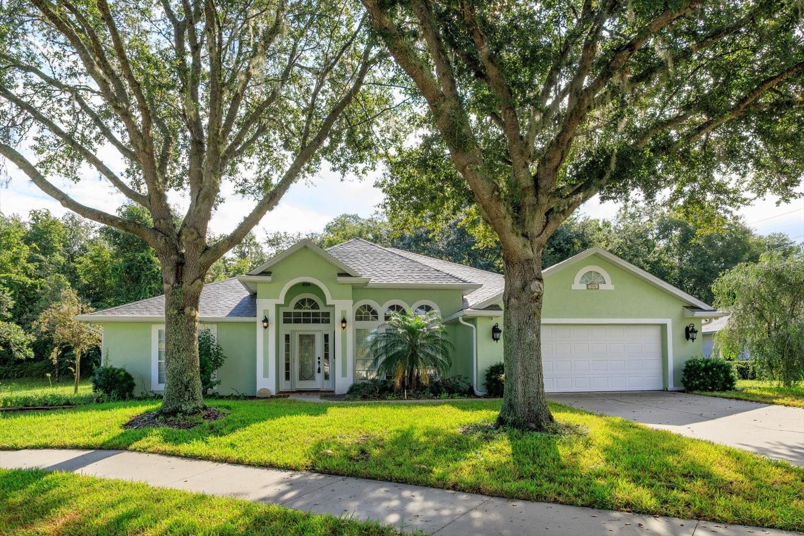 Welcome to 549 Quail Lake Drive in the DeBary Golf & Country Club community. This 4 bedroom 2 bath home is nestled on a perfectly situated quiet cul-de-sac with serene lake views. The open floor plan offers a seamless flow throughout. This traditional floor plan offers a formal Dining and Living room. The oversized Family room opens up to a large screened porch. The kitchen offers an abundance of cabinet space and granite counters, perfect for casual dining or entertaining. The primary suite offers a huge custom walk-in closet with an ensuite that has a soaking tub and a walk-in shower. DeBary Plantation is conveniently located near shopping, dining, I-4, Sun Rail, and the St. Johns River, with easy access to Downtown Orlando and the beaches. Debary Golf & Country Club has memberships available for golf, tennis, pickleball, fitness center, pool and dining. Be home for the holidays as this home is priced to sell!
