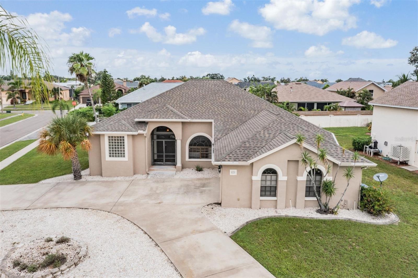 Welcome to your slice of Florida paradise in the heart of Apollo Beach! This updated 4-bedroom, 3-bathroom home offers over 2,000 sq. ft. of bright, open living space designed for both comfort and fun. Sitting on an oversized 1/4+ acre corner lot with a circle driveway, there’s plenty of space for family and friends to come and go with ease.
Inside, enjoy a fresh boho-inspired design, soaring ceilings, arched windows, and carpet-free living that flows seamlessly from room to room. The updated kitchen with crisp white cabinetry, sleek quartz countertops, and breakfast bar makes everyday meals and weekend gatherings a breeze.
Step outside to your personal resort-style retreat, complete with a heated pool, sprawling screened lanai, and covered dining area perfect for BBQs and lazy afternoons. The pool deck even has its own full bathroom for convenience! The split floor plan offers privacy with a spacious primary suite featuring dual walk-in closets, spa-style bath, and direct pool access.
Practical touches like a separate laundry room with sink and storage, side-entry garage with built-ins make this home full of function and form!
Looking for the ultimate Florida investment property? This Apollo Beach home checks all the boxes for a high-performing vacation rental! With 4 bedrooms, 3 full bathrooms it easily accommodates large families and groups. Guests will love the oversized lot with easy circle-drive parking, open-concept layout, and stylish coastal-inspired finishes. The kitchen is fully updated for cooking at home, while the heated pool, massive screened lanai, and poolside full bathroom create an unbeatable outdoor experience for year-round renters.
Nestled in the vibrant waterfront community of Golf and Sea Village in Apollo Beach, you’ll be just minutes from parks, marinas, schools, dining, and a quick drive into Tampa. With updates including a 2024 A/C, 2024 pool heater, 2021 roof, and fresh paint, this home is truly move-in ready.