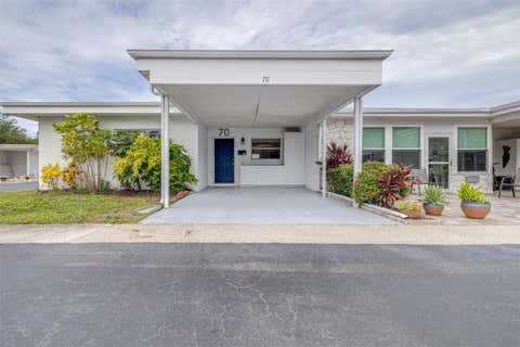 Photo of 13940 Anona Heights Drive #70, Largo, FL 33774 (MLS # TB8538392)