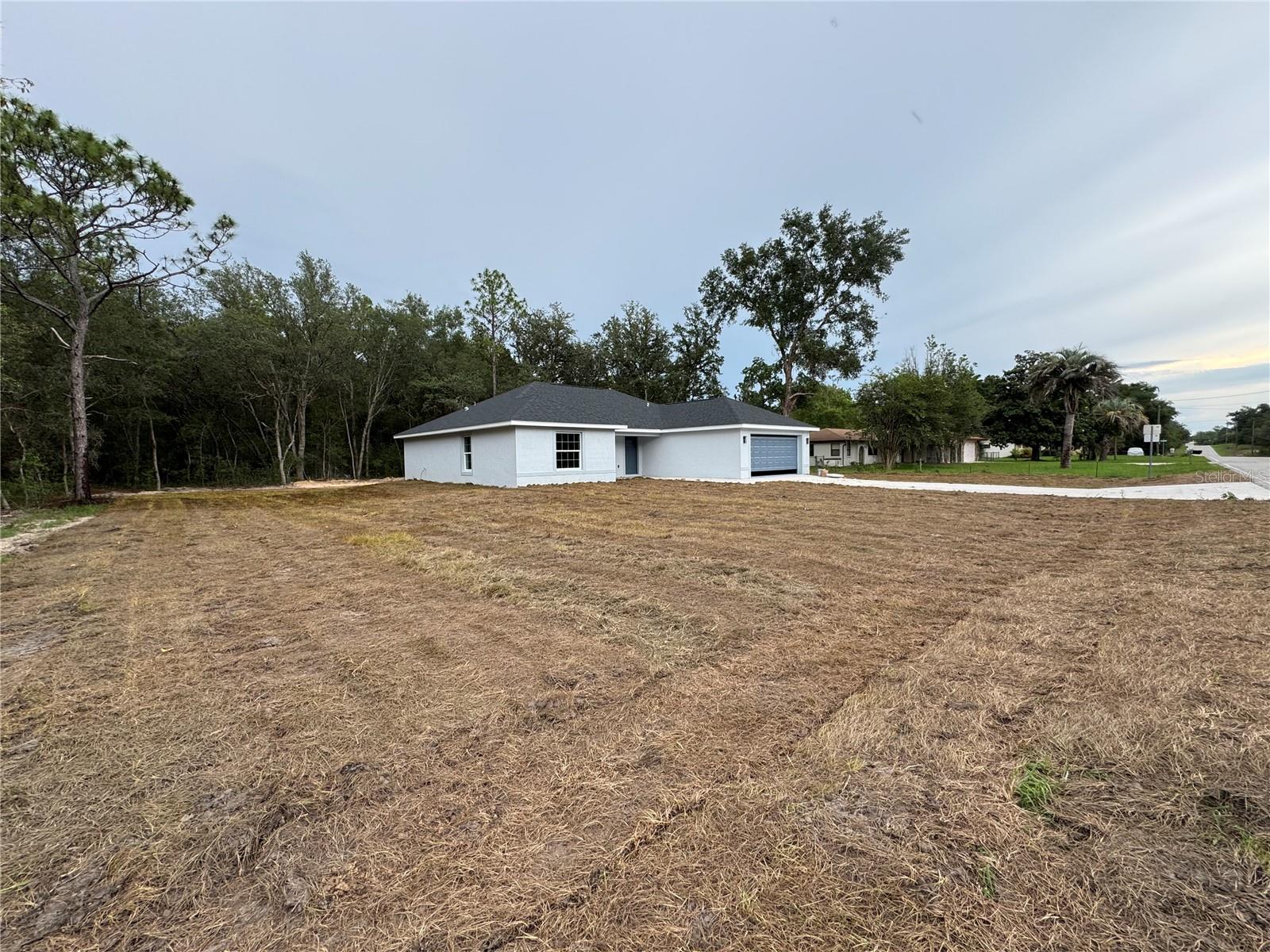 New Beautiful 4 Bedroom and 2 Bath Home. Many upgrades, stone counters, hard surface flooring throughout, ceiling fans, stainless steel appliances, and versatile island with breakfast bar. Master suite offers double vanity sink, tub, walk-in shower, and walk-in closet. NO HOA, NO Deed Restrictions, NO Flood Zone! Block and stucco exterior, two car garage with automatic garage door opener. Conveniently located to shopping, medical facilities, water activities, anything nature and restaurants. Make your appointment today. If you're ready to MOVE this is the one.