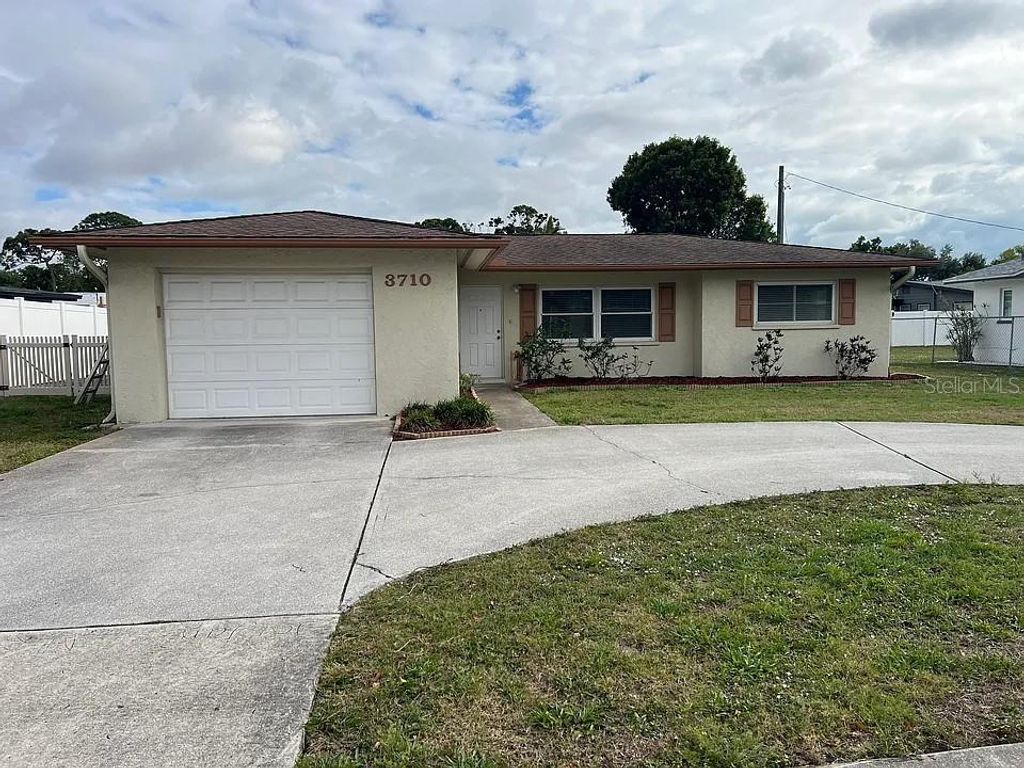 Photo of 3710 Wilkinson Rd, Sarasota, FL 34233 (MLS # A4691476)