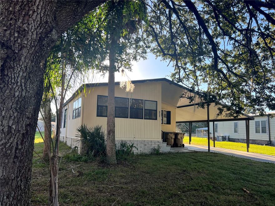 INVESTORS LOOK NO FURTHER! This Doublewide property offers 2 beds/2 baths with a FLORIDA ROOM. Just needs some TLC and then ready to go! Open concept home with covered parking and Laundry Room/Storage under roof. Home has lots of potential! Association amenities include Cable TV, Clubhouse, Park, Pickleball Courts, Playground, Pool, Recreation Facilities, and Tennis Court(s). Located in the peaceful and desirable subdivision of BROADMOOR. This KISSIMMEE home is approximately 20 minutes from DISNEY WORLD FLORIDA PARKS. Call today for your private showing.