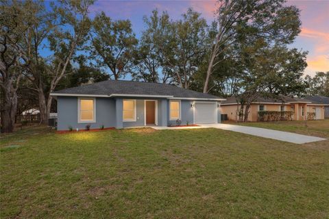 Photo of 24035 NW Amberjack Avenue, Dunnellon, FL 34431 (MLS # OM717167)