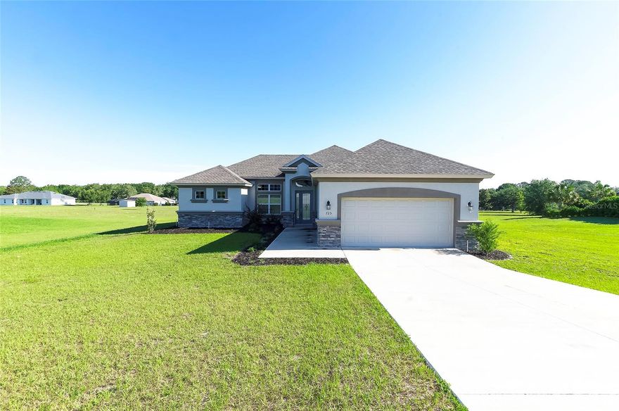 Welcome to this beautiful 3 bedroom 2 bath home Ct located in the highly desirable community of Citrus Hills in Hernando, FL! Built in 2022 and situated on a spacious 1 acre lot, this beautifully maintained 3 bedroom, 2 bathroom home offers the perfect blend of modern comfort and peaceful Florida living. Step inside to an open and inviting floor plan filled with natural light, high ceilings, and stylish finishes throughout. The spacious kitchen features modern appliances, ample cabinet space, and a large island overlooking the living and dining areas, making it perfect for entertaining or everyday living. The primary suite offers a relaxing retreat with a large walk in closet, dual vanities, and a beautifully designed walk in shower. The additional bedrooms are generously sized and ideal for family, guests, or a home office. Enjoy your mornings or evenings on the screened lanai overlooking the oversized backyard with plenty of room to add a pool, detached garage, or create your dream outdoor oasis. Additional features include a 2 car garage, indoor laundry room, and newer washer, dryer, refrigerator, dishwasher, and microwave included with the home. This home includes the mandatory Citrus Hills Golf & Country Club Social Membership, often referred to as the “Keys to the Kingdom,” giving residents access to an incredible lifestyle and resort style amenities throughout the community. Conveniently located near shopping, restaurants, golf courses, outdoor recreation, and the beautiful Nature Coast while still offering the peace and privacy of country style living. This move in ready home is one you do not want to miss!