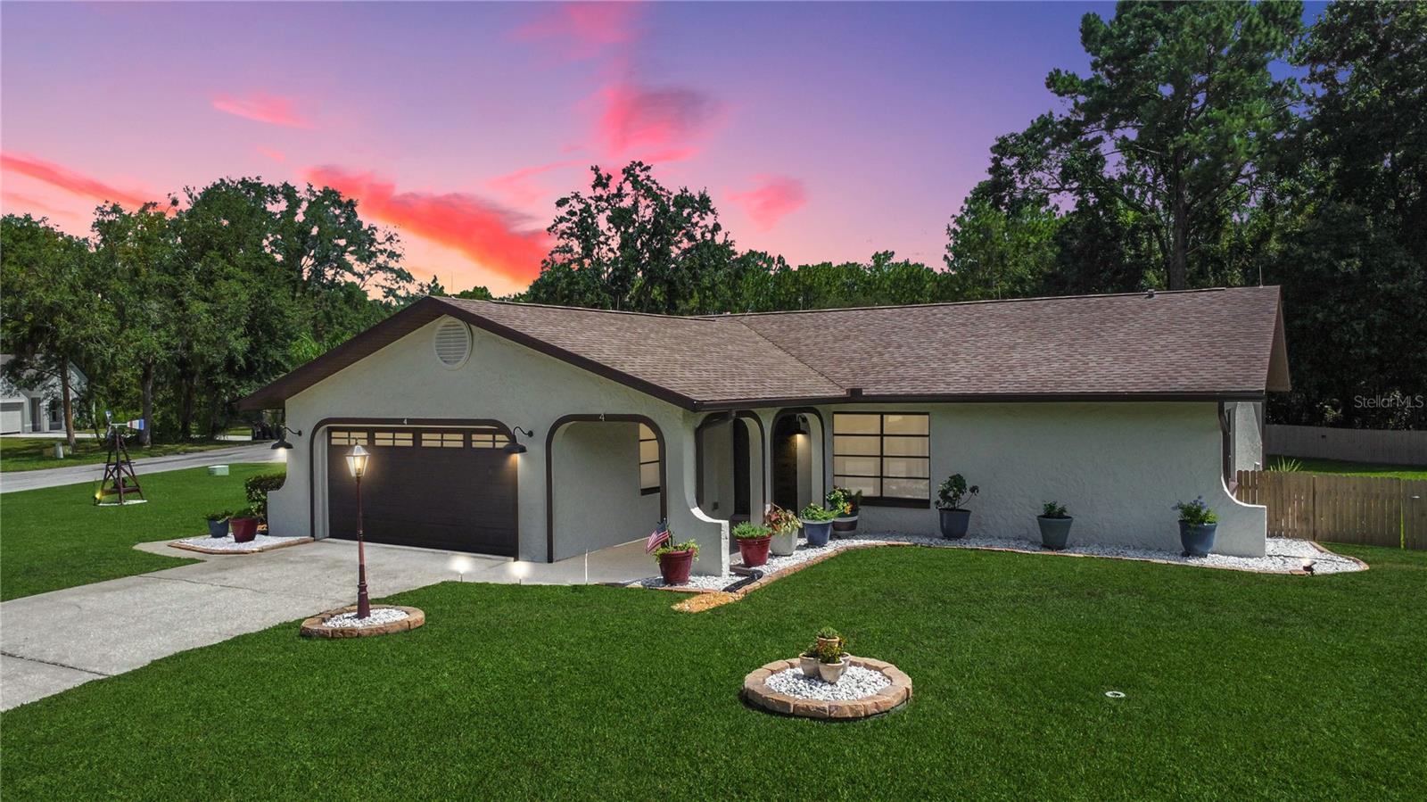 Discover this beautifully maintained 3-bedroom, 2-bathroom home nestled in the desirable golf course community of Sugarmill Woods, Florida. Situated on a spacious corner lot on a cul-de-sac, this 1,357 sq ft home offers both comfort and functionality with a split floor plan and durable vinyl and tile flooring throughout. Step into the inviting all-season Florida room, highlighted by elegant coffered ceilings, perfect for year-round enjoyment or entertaining. The fenced backyard provides privacy and includes an attached shed with water hookup—ideal for extra storage, a lawn mower, or even a golf cart. A double gate on one side adds convenient access. Enjoy well-manicured landscaping, enhanced curb appeal with a fresh exterior paint (2022), and peace of mind with recent major upgrades including a new roof (2024) with a transferrable warranty, HVAC (2019), hot water tank (2023), water saving toilets (2022), ample attic storage with an attic fan and added drainage at the base of the driveway to protect against runoff and a lawn irrigation system. This home combines low-maintenance living with stylish touches in a serene setting—perfect for full-time residents, a vacation home, or golf enthusiasts. Don’t miss your chance to live in one of Citrus County’s most sought-after communities!