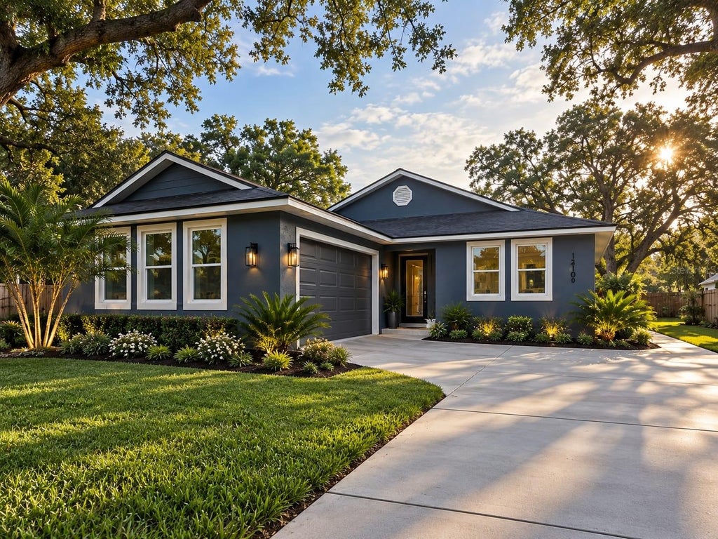 Photo of 13105 N Blvd, Tampa, FL 33612 (MLS # TB8551524)