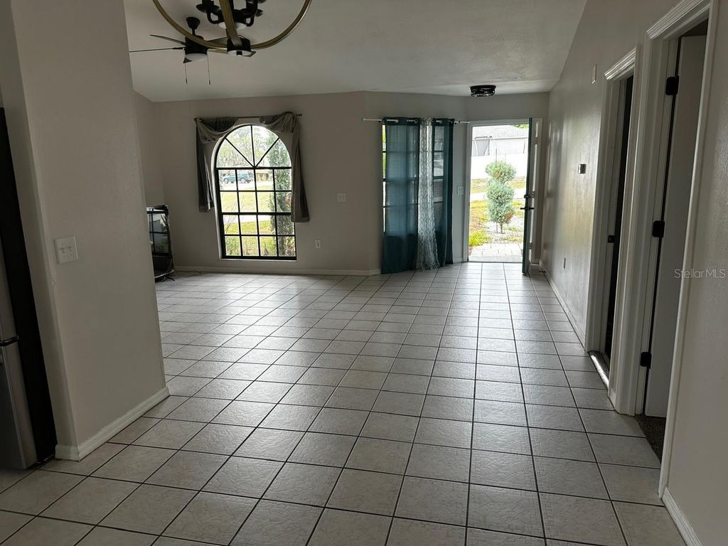 Photo of 409 Elkin Avenue, Deltona, FL 32738 (MLS # O6405177)