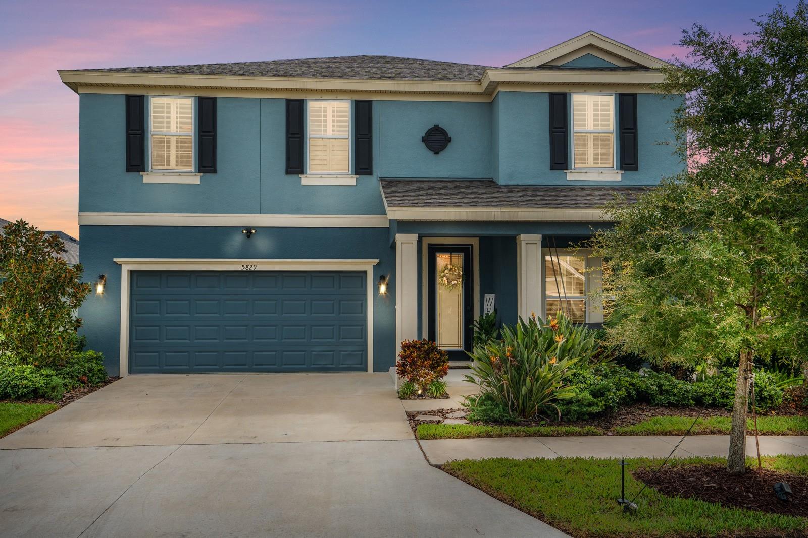 Welcome to your slice of paradise! This stunning 2021 WestBay Fisher two-story model home is located in the highly sought-after Waterset Resort-Style Community in Apollo Beach. Designed for both comfort and style, it offers a spacious open floor plan, soaring ceilings, and an abundance of natural light. The gourmet kitchen boasts stainless steel appliances, a large center island, Plantation shutters throughout the home and ample storage. The Livingroom has an Amazing Custom-Built Quartzite Ledgestone wall, with a Built in Electric Fireplace.
Step outside to a fully fenced backyard with a covered lanai—perfect for relaxing or hosting BBQs. Inside, you’ll find 4 generously sized bedrooms, including an owner’s suite with a spa-like bath and walk-in closet, plus 2.5 bathrooms, an upstairs loft, and a versatile downstairs bonus room ideal as a game room, media room, office, or guest space.
Living in Waterset means access to unbeatable amenities: multiple pools with waterslides, splash pads, a state-of-the-art clubhouse, fitness center, dog parks, scenic trails, pickleball and basketball courts, and playgrounds. Conveniently located just minutes from shopping, dining, and major highways, with quick access to Tampa, top-rated schools, beaches, and more.
Don’t miss your chance to own this Florida gem—schedule your private tour today!