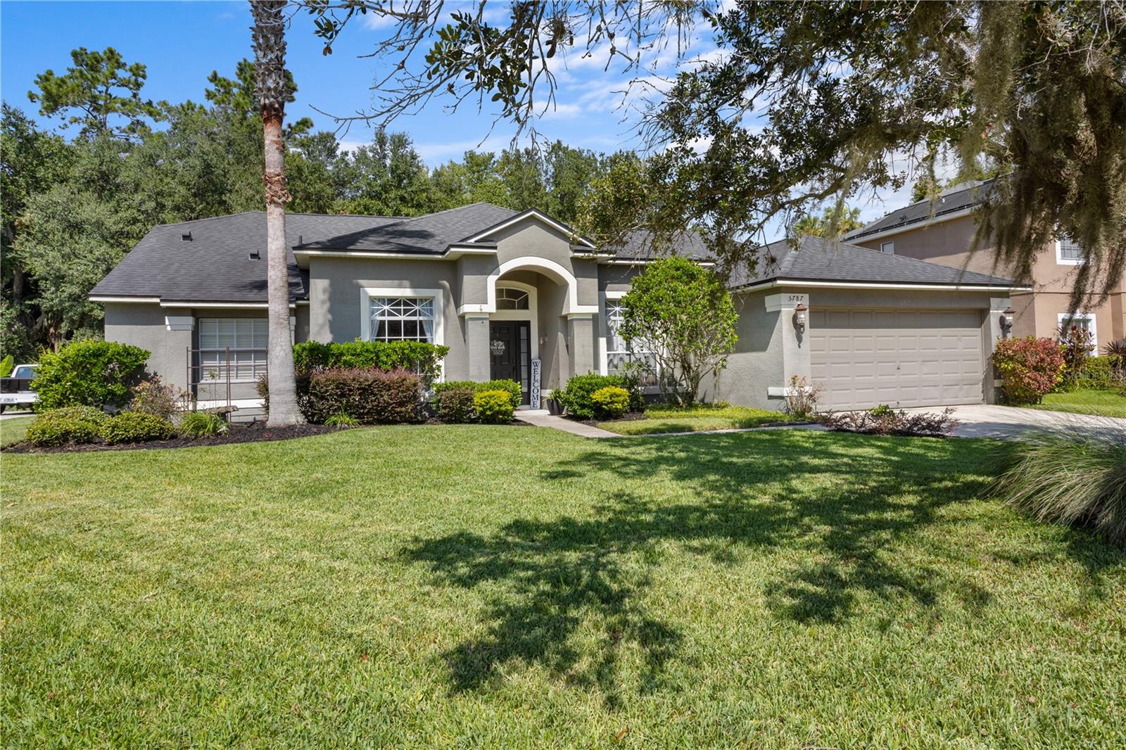 Stunning 4-Bedroom 3 Bathroom SINGLE-STORY Pool Home on a Conservation Lot – No Stairs!
Welcome to your dream home in the highly sought-after community of Autumn Chase! This beautifully designed home features a unique 3-way split floor plan, offering privacy and flexibility for the whole family. The spacious primary suite is tucked away on one side of the home, creating a peaceful retreat with its inviting en suite, generous closet space and french doors leading to your private pool. On the opposite side, two additional bedrooms share a full second bathroom, perfect for family or guests. The fourth bedroom, located separately with the third bathroom, is ideal for a guest suite, home office, or multigenerational living. The thoughtful layout complements the home’s open living spaces, providing both comfort and convenience. Situated on a serene conservation lot with no rear neighbors, this home features a light and airy open concept floor plan with soaring high ceilings and plenty of natural light throughout. The eat-in kitchen is a chef’s delight, boasting white 42" solid wood cabinetry with crown molding, granite countertops, breakfast bar, and open to the family room for entertaining. The home's thoughtful layout offers both comfort and functionality, perfect for families and guests alike. Even the laundry room offers comfort with wall cabinets and shelving. Step outside to your private oasis – a saltwater pool with, pebble tech finish, LED lights, water fountains, sunbathing deck, paver deck and surrounded with a white vinyl fence, built in 2019, ideal for relaxing, entertaining, or enjoying Florida's sunny days year-round. Conveniently located near SR 417, Sanford Airport, shopping, dining, entertainment and more, this home offers the perfect balance of privacy and accessibility. Don’t miss this rare opportunity to own a modern pool home on a premium lot in one of Sanford’s most desirable neighborhoods!