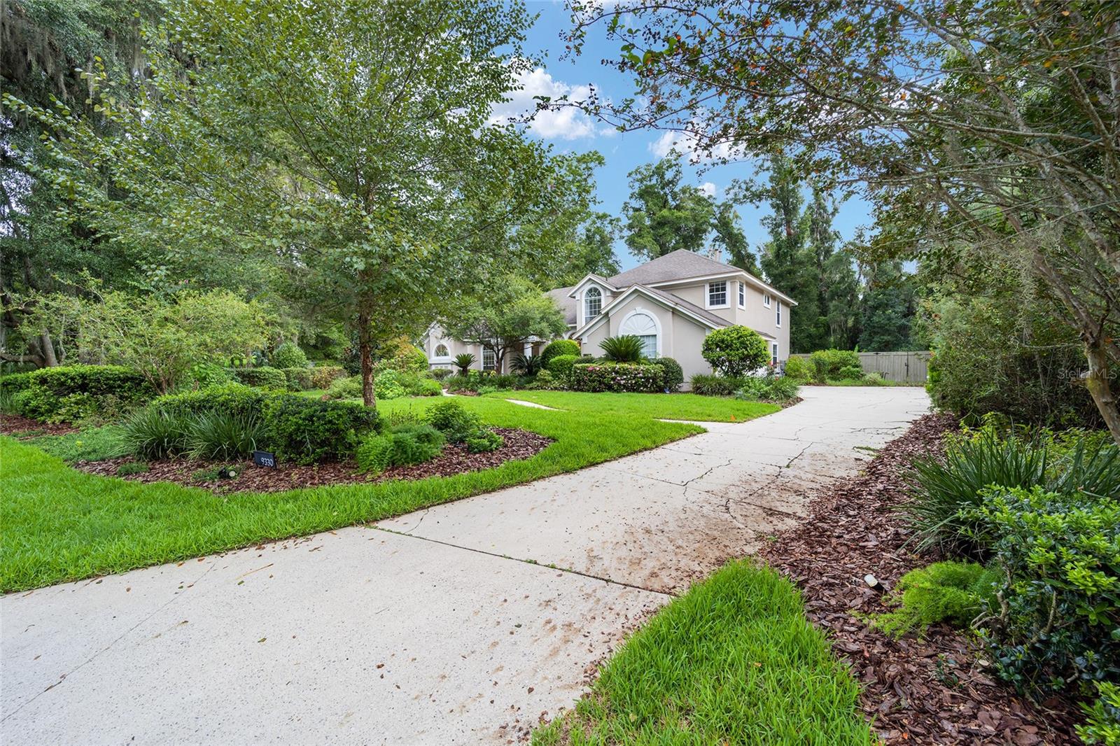 Welcome to this stunning 5-bedroom, 4-bathroom home located in the vibrant city of Gainesville, FL. This property boasts a spacious 2-car garage and a private, fenced backyard, perfect for outdoor activities. The open floor plan allows for seamless transitions between rooms, creating a harmonious living space. The kitchen is a chef's dream, equipped with stainless steel appliances and a double island for ample preparation space. The home also features a bonus room, ideal for a home office or gym. The primary bedroom comes with a custom closet, offering plenty of storage. The gas fireplace adds a cozy touch to the living area, perfect for those cooler evenings. The property also includes a convenient laundry room with a dry sink. As an added bonus, lawn service is included, ensuring your outdoor space always looks its best. And let's not forget the swimming pool, a refreshing retreat for those hot Florida days. This home truly has it all!