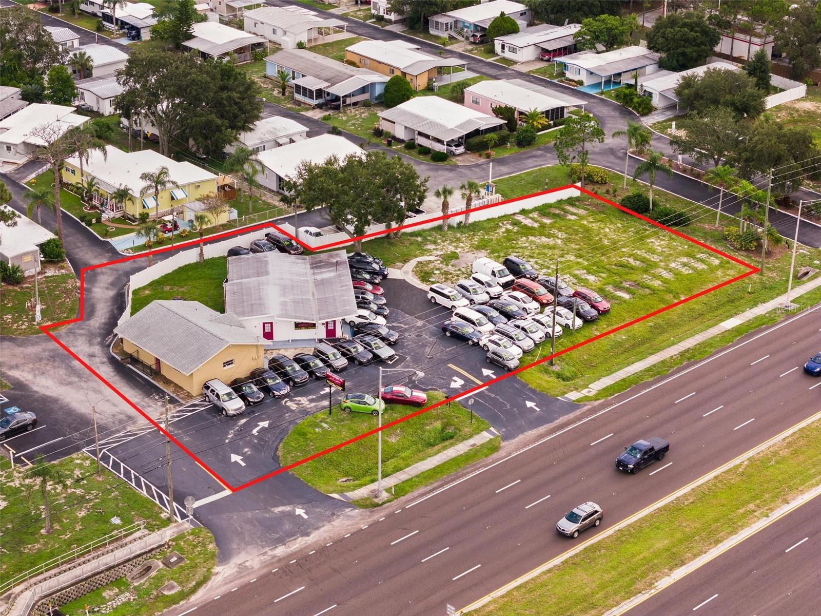 Currently operating as a used car lot. Offered for Sale as a redevelopment site with significant auto parking, trailer parking, retail development site, outside storage site, a laydown yard, or a restaurant pad.
