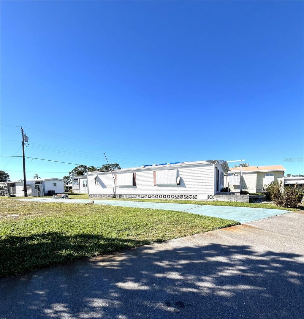 Photo of 234 Trailorama Drive, North Port, FL 34287 (MLS # N6142003)
