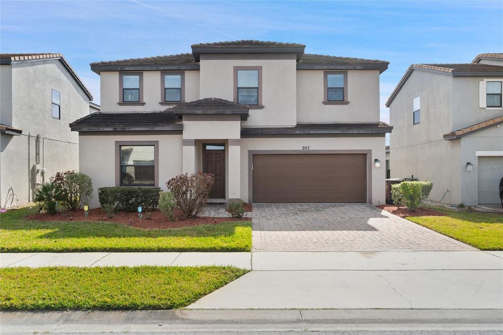 Photo of 203 Kenny Boulevard, Haines City, FL 33844 (MLS # O6377085)