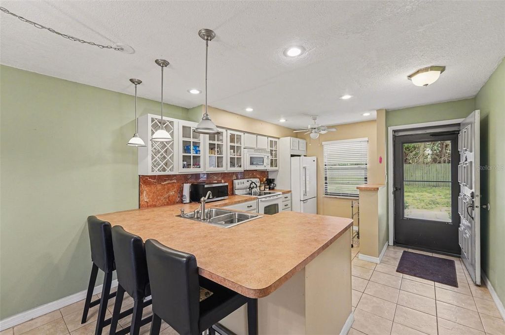 Photo of 4800 Lake Villa Drive, Clearwater, FL 33762 (MLS # TB8475321)