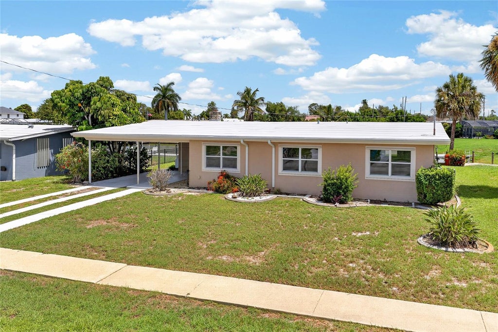 Photo of 321 Weber Terrace, Port Charlotte, FL 33952 (MLS # C7528204)
