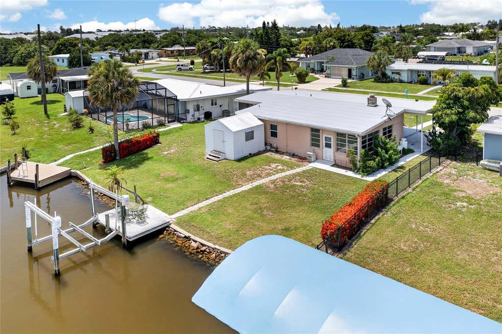 Photo of 321 Weber Terrace, Port Charlotte, FL 33952 (MLS # C7528204)