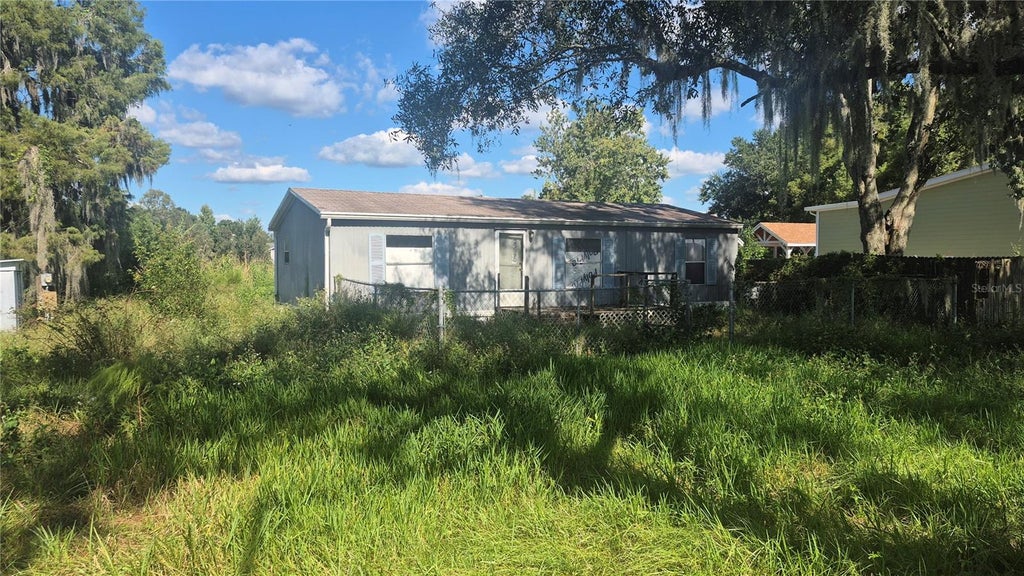 Photo of 6408 Land O Lakes Boulevard, Land O Lakes, FL 34638 (MLS # TB8558158)