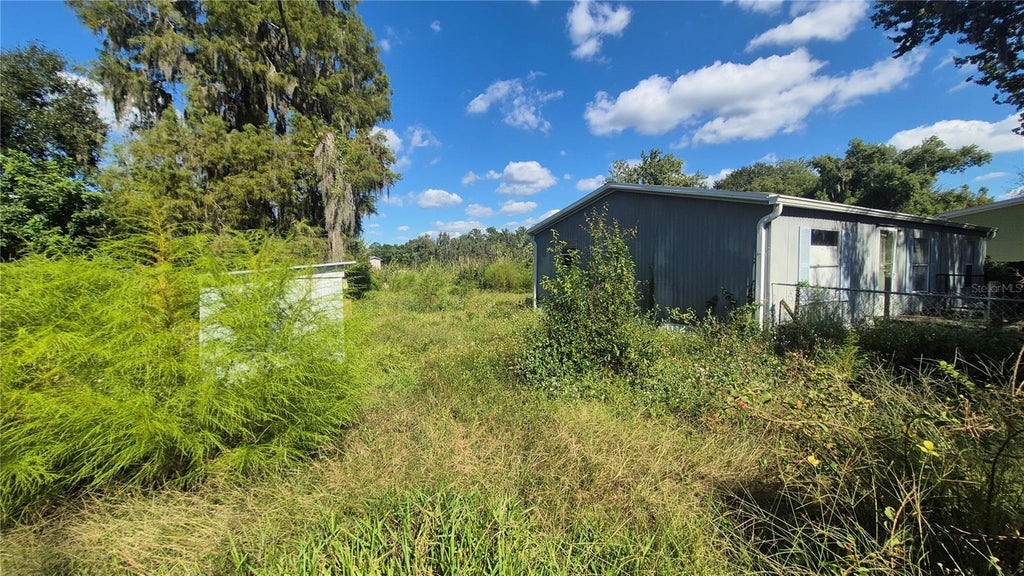 Photo of 6408 Land O Lakes Boulevard, Land O Lakes, FL 34638 (MLS # TB8558158)
