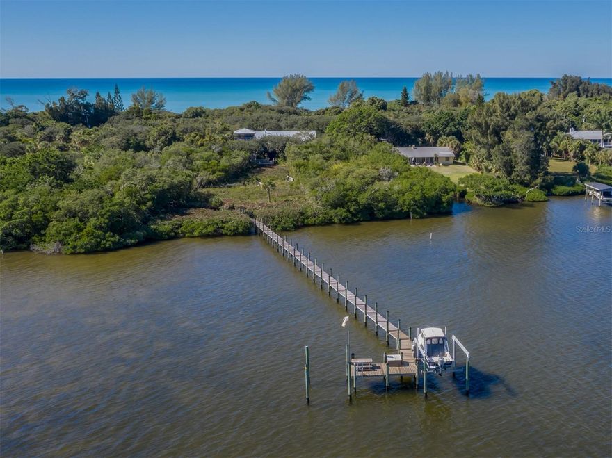 Unwind and reconnect with the essence of coastal living in this captivating 2-bed, 2-bath haven on Manasota Key Island. Nestled on the serene bay side, this home offers the best of both worlds: tranquil waterfront vistas and direct access to the vibrant Gulf of Mexico. Dock your boat right outside: Cruise the waters and explore hidden coves with ease. Unwind on expansive balconies: Savor breathtaking bay views, fiery sunsets, and starlit nights under the Florida sky. Ascend to your private crows nest: Enjoy panoramic vistas of the island and endless horizons. Explore hidden gems: Take a leisurely stroll on private trails, including one leading directly to the pristine Gulf shores. Immerse yourself in the vibrant Island lifestyle: Explore charming boutiques, savor fresh seafood, and discover hidden beaches. Minutes away from world-class fishing, kayaking, and paddleboarding.
