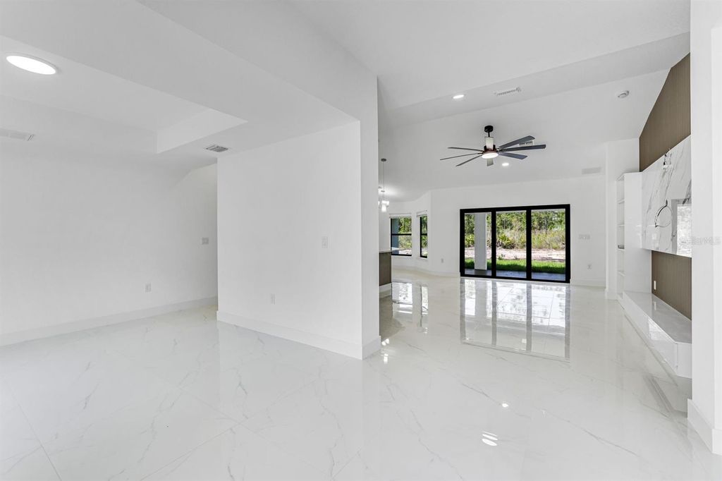 Photo of 2702 50th Street SW, Lehigh Acres, FL 33976 (MLS # TB8520051)
