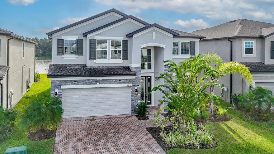 Stunning / M/I Home with Pond View | Gated K-Bar Ranch | Built 2023

Like-new 5BR/5BA home with 2-car garage in gated K-Bar Ranch. Features two master suites (one on the main floor), ideal for guests or multigenerational living. Upgrades include luxury vinyl plank flooring, a formal living/dining area, and a spacious family room.

The gourmet kitchen features modern cabinets, stainless steel appliances, a cooktop, double ovens, a walk-in pantry, and a butler’s pantry. First-floor laundry with washer/dryer included. The great room opens to a covered lanai with a tranquil view of the pond.

Upstairs, the space boasts a large bonus room and a luxurious primary suite with tray ceilings, a walk-in closet, a soaking tub, double vanities, and a walk-in shower. Two upstairs bedrooms also feature walk-in closets.

Community amenities include a pool, playground, tennis courts, and a basketball court. Close to I-75,  schools, shopping, dining, and healthcare.  Schedule your private tour today and experience the lifestyle you’ve been dreaming of.