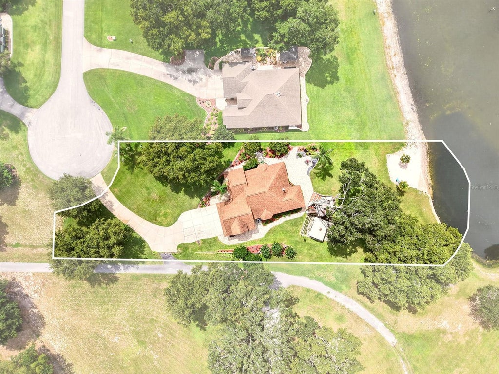 Photo of 1833 Shore Line Drive, Leesburg, FL 34748 (MLS # R4911877)