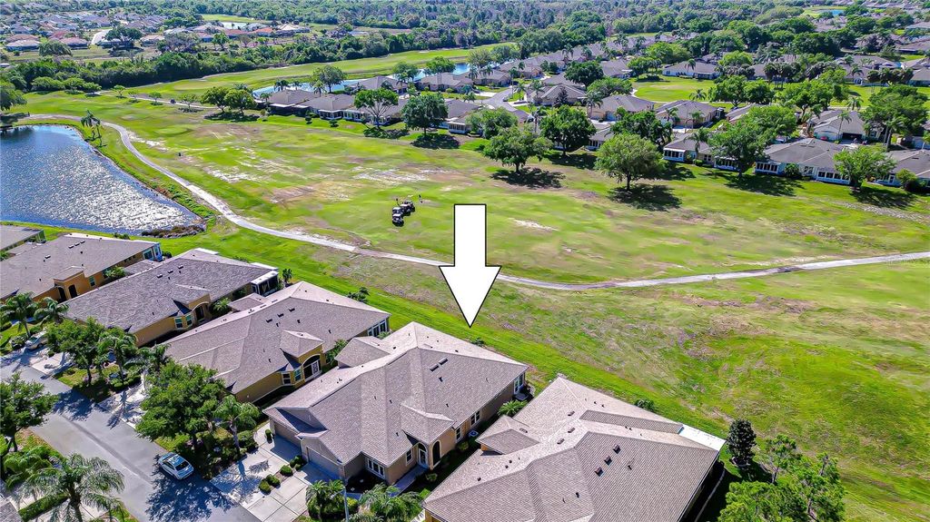 Photo of 984 Pembroke Point Way, Sun City Center, FL 33573 (MLS # TB8492677)