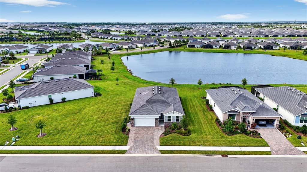 Photo of 18145 Beach Ranch Terrace, Bradenton, FL 34211 (MLS # A4703894)