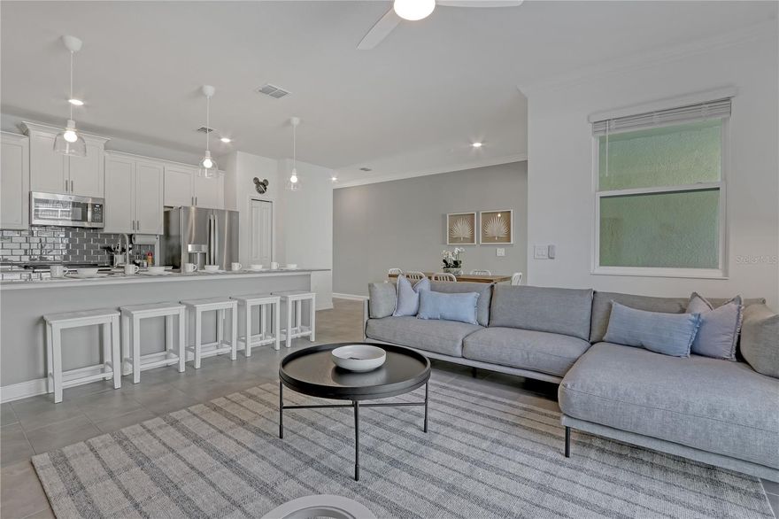 Beautiful 4-bedroom, 3-bathroom townhome located in the highly desirable Stoneybrook community within ChampionsGate. This fully furnished property is ideal for short-term rental, Airbnb, vacation home, or primary residence, offering excellent income potential and flexibility. The home features a spacious and functional layout designed to accommodate up to 10 guests, with an open-concept living area, fully equipped kitchen, and in-unit washer and dryer for added convenience. A private pool with heater provides year-round enjoyment and enhances rental appeal. Professionally designed by short-term rental specialists with over $20,000 in upgrades, this property has been meticulously maintained and is ready for immediate use or income generation, with strong booking history and consistent demand. Residents and guests enjoy access to resort-style amenities, including The Oasis Club and The Retreat, featuring restaurants, bars, clubhouse, swimming pools, fitness center, tennis courts, arcade, and beautifully maintained common areas. Additional amenities include access to the ChampionsGate PGA golf course and full sports facilities. Conveniently located near shopping, dining, golf, and world-renowned theme parks, this property offers a unique combination of location, lifestyle, and investment opportunity.