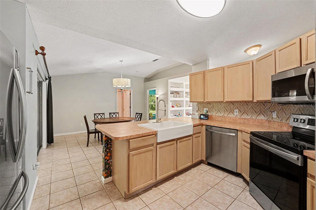 Photo of 107 Mediterranean Court, Kissimmee, FL 34758 (MLS # O6443851)
