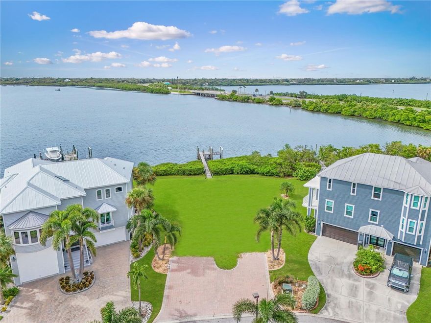 Located in the gated enclave of Terra Ceia Bay Estates, this rare waterfront lot presents an unmatched opportunity to design and build your own coastal retreat. With only ten residences in the community, privacy and exclusivity are paramount.

Featuring 118 feet of direct bay frontage and a private dock with boat lift, the property offers no-bridge access to the Gulf —perfect for boaters and anglers alike. Spend your days casting for snook and redfish, exploring local sandbars, or cruising by boat to waterfront dining. The property’s northwestern exposure captures breathtaking sunsets over Terra Ceia Bay, setting the stage for a truly enviable lifestyle.

Offering nearly one-third of an acre, the homesite is primed for an elevated, coastal-inspired residence with sweeping views from the bay out to the Gulf. Unlike older homes or dated floorplans, this property allows you to build to your exact specifications and incorporate the latest in design, technology, and construction. A completed survey, environmental studies, and a full set of engineered house plans are available to jumpstart your vision.

As part of this boutique, maintenance-free community, residents enjoy a pool just steps from the property, as well as lawn care and irrigation included in the HOA—delivering all the benefits without the upkeep. Ideally located, Terra Ceia Bay Estates offers easy access to downtown St. Petersburg, Tampa, Sarasota, and the Gulf beaches within 25 minutes.

This is more than a lot—it’s a rare chance to create a custom waterfront estate in one of the Gulf Coast’s most special neighborhoods.